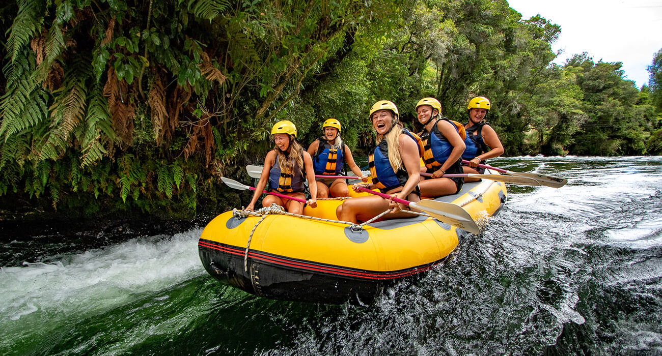 Females rafting in New Zealand