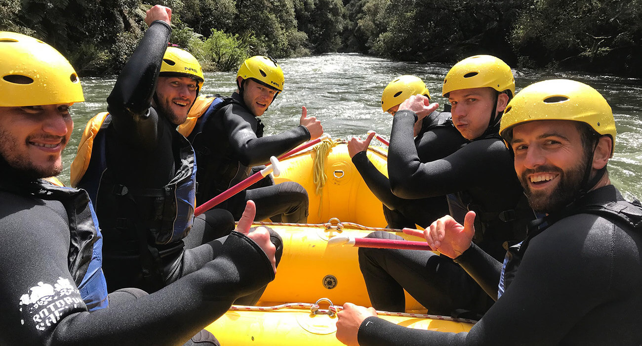 Stag do's celebrating on the Stag do rafting