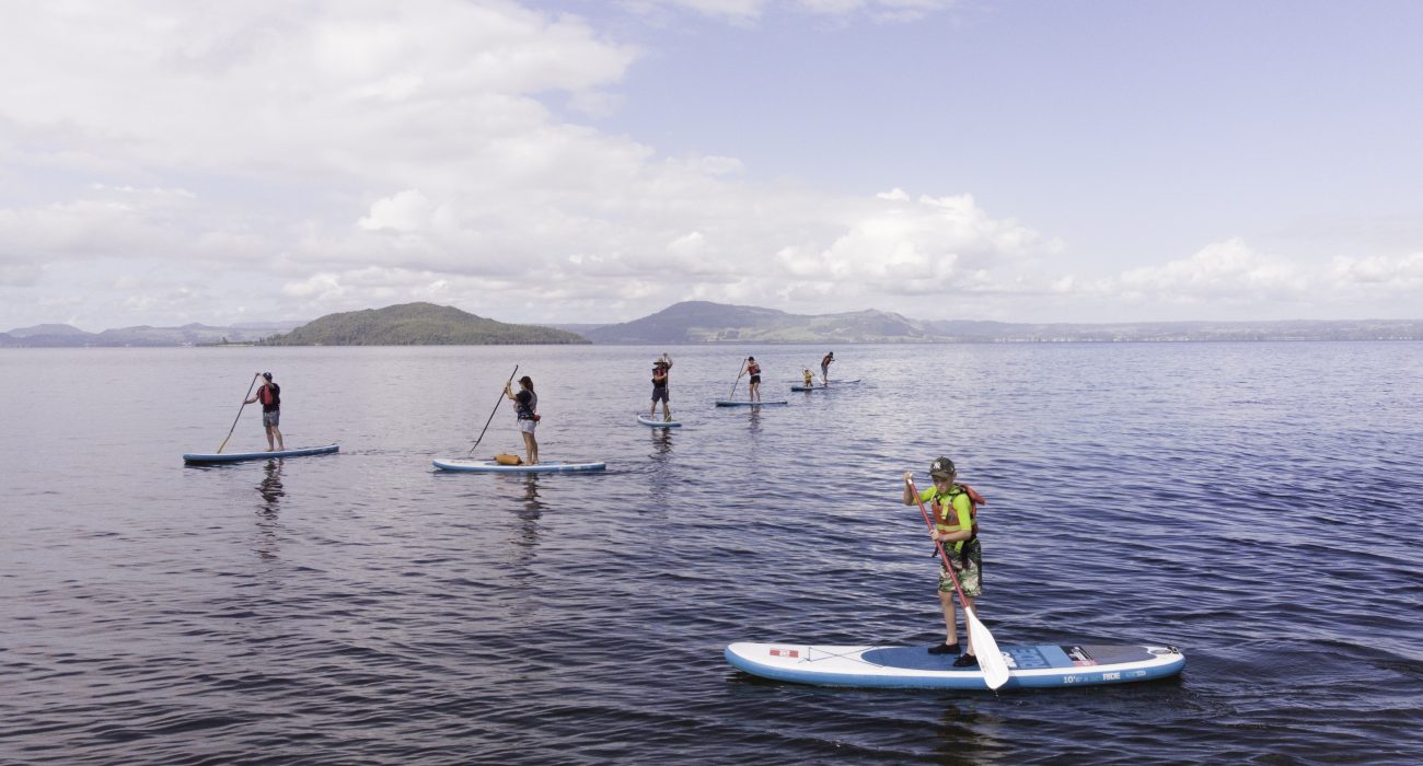 Stand Up Paddle Boarding in Rotorua with School